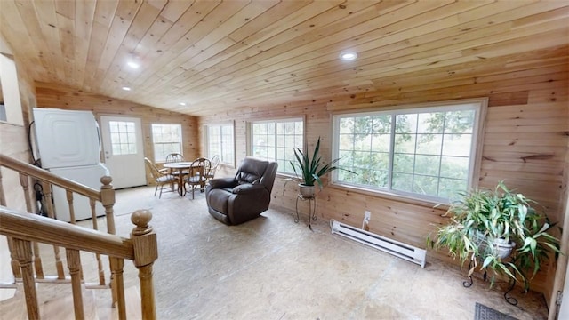 living area with vaulted ceiling, wooden ceiling, a baseboard radiator, and plenty of natural light