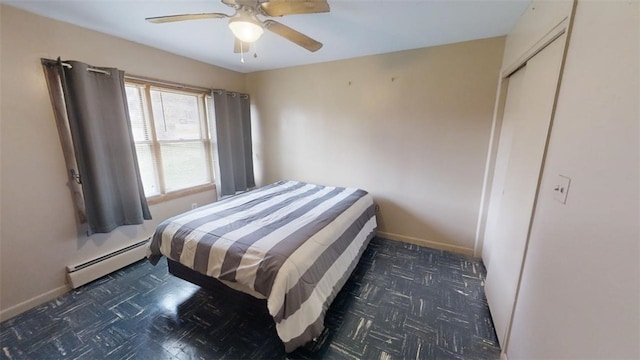 bedroom featuring a baseboard radiator and ceiling fan