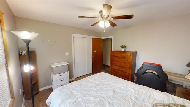 bedroom featuring a closet and ceiling fan