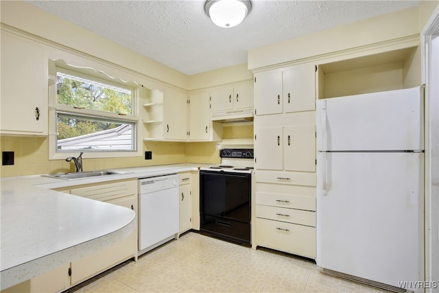 kitchen with backsplash, sink, white cabinetry, a textured ceiling, and white appliances