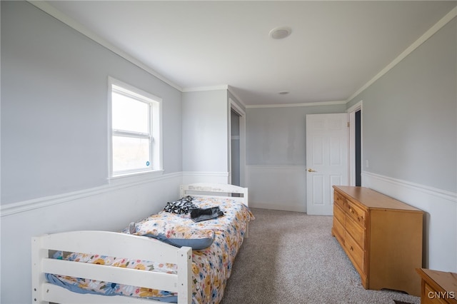 bedroom featuring light carpet and ornamental molding