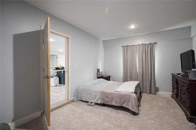 bedroom with light carpet