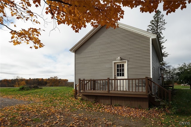 view of home's exterior featuring a deck