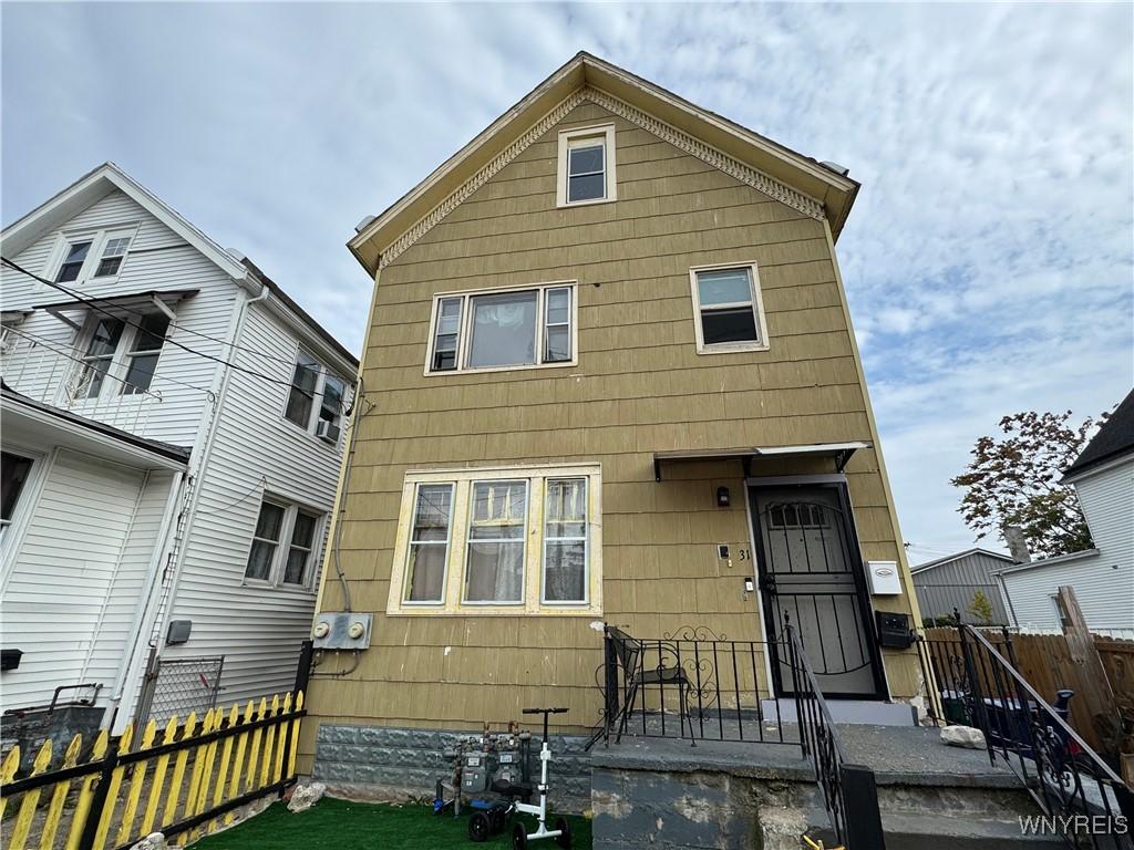 31 Spiess St, Buffalo, NY 14211 - view of front of home with fence private yard