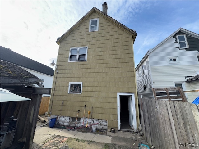 back of house with a patio