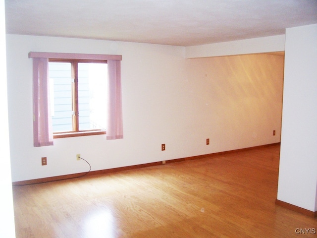 empty room featuring hardwood / wood-style floors