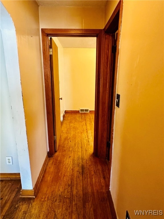 hall featuring hardwood / wood-style floors