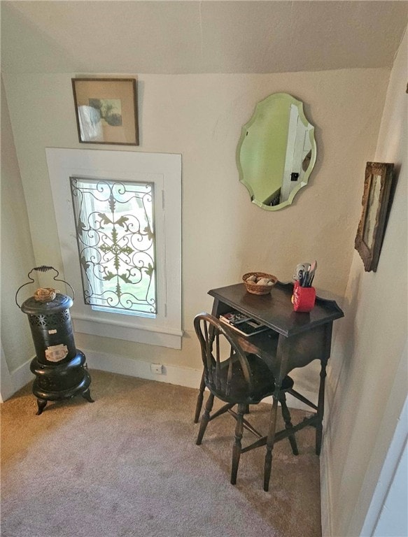 view of carpeted dining space