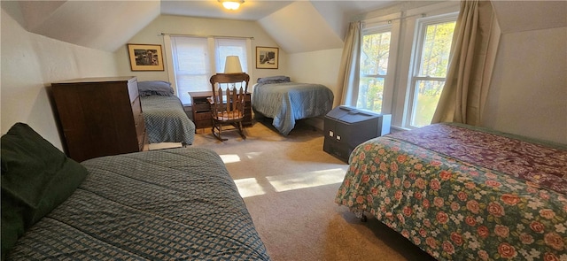 bedroom featuring lofted ceiling and light colored carpet