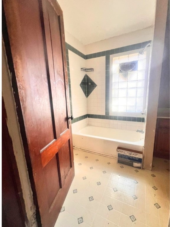 bathroom with tile patterned flooring