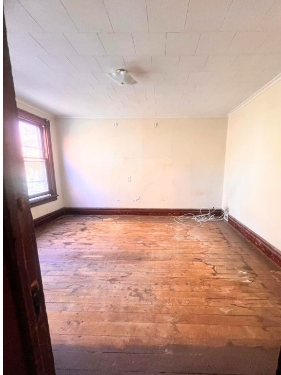 spare room featuring hardwood / wood-style floors