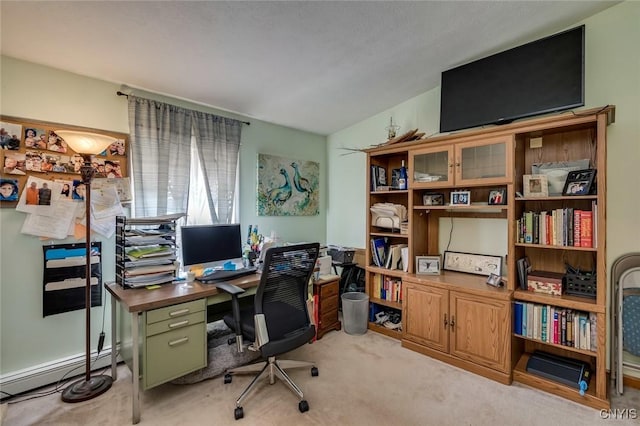 office featuring carpet floors and a baseboard heating unit