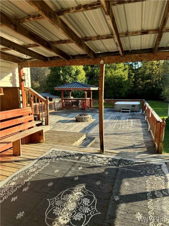 wooden deck with a gazebo