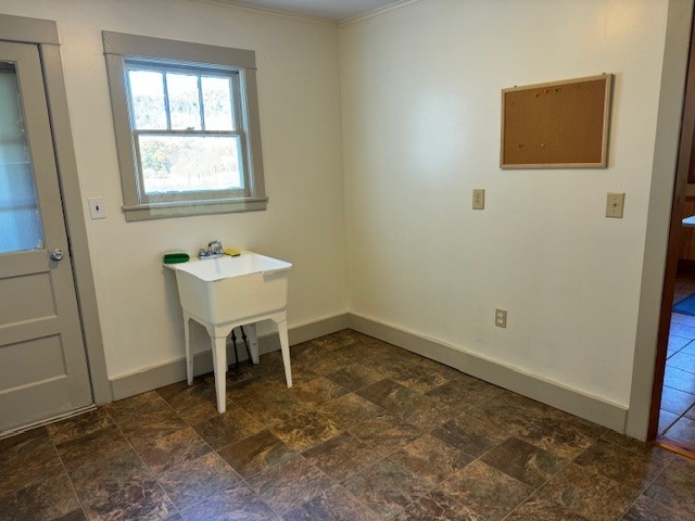 laundry room with ornamental molding