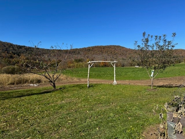 property view of mountains featuring a rural view