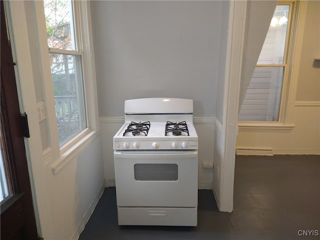 kitchen with white gas range