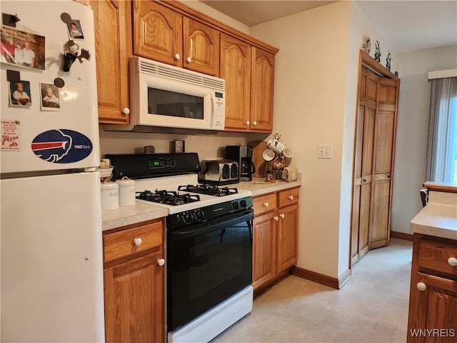 kitchen featuring white appliances