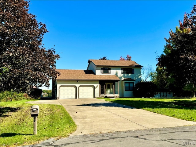 view of front facade featuring a garage and a front lawn