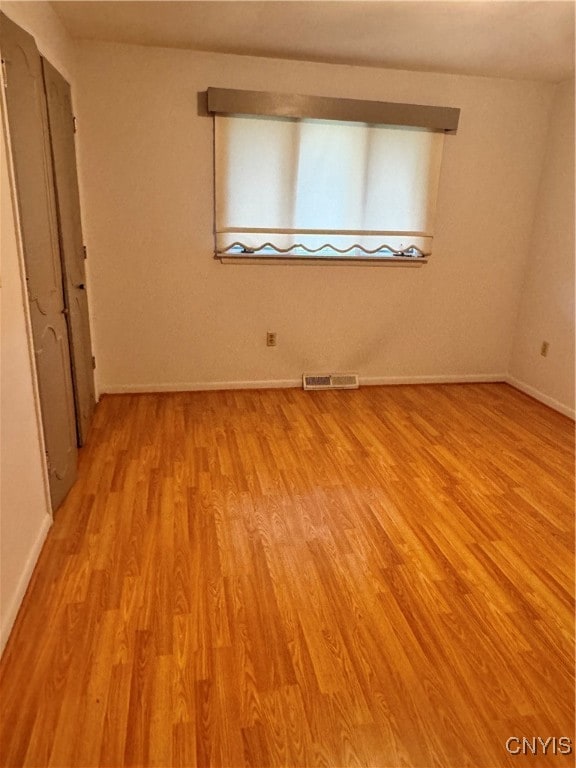 unfurnished bedroom with light hardwood / wood-style floors