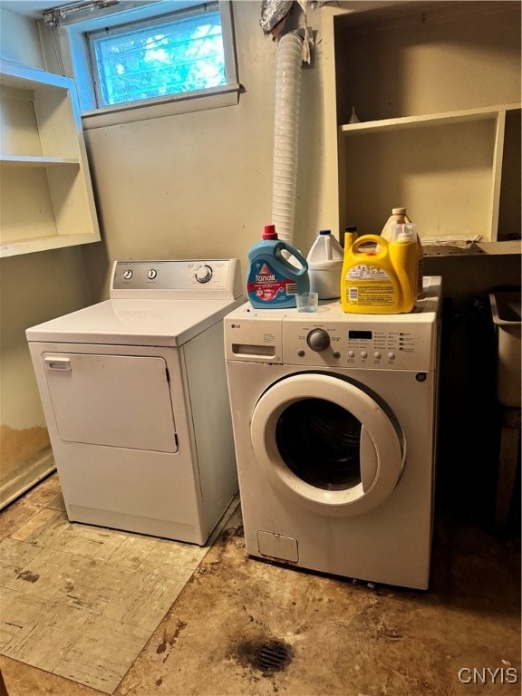 laundry area with washer and clothes dryer