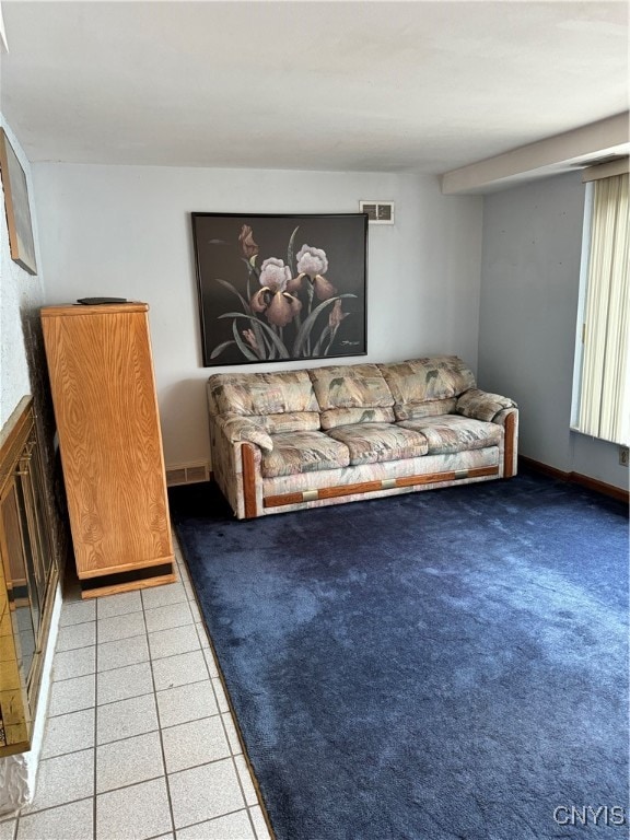 living room featuring tile patterned floors