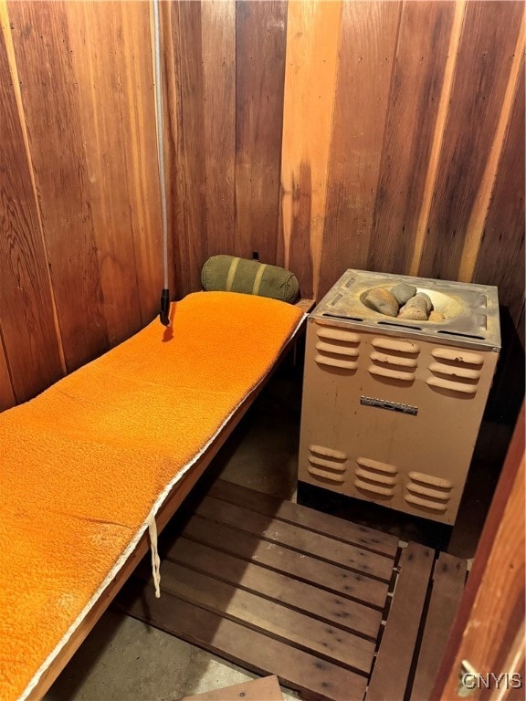 view of sauna featuring wood walls