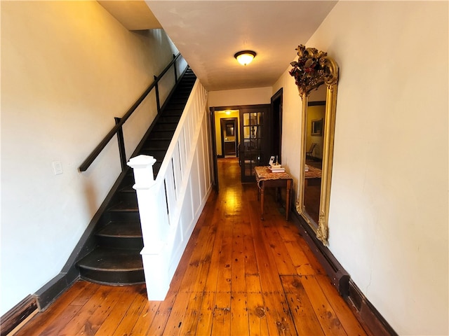 hallway featuring dark wood-type flooring