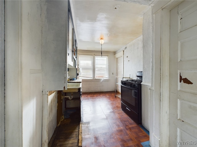 kitchen with black gas stove