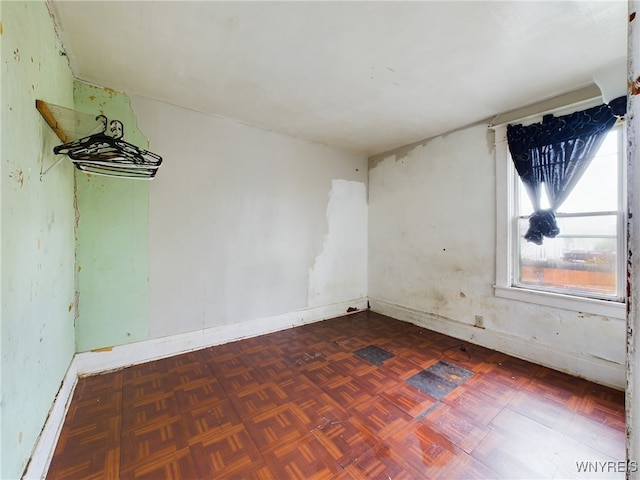 empty room featuring parquet floors