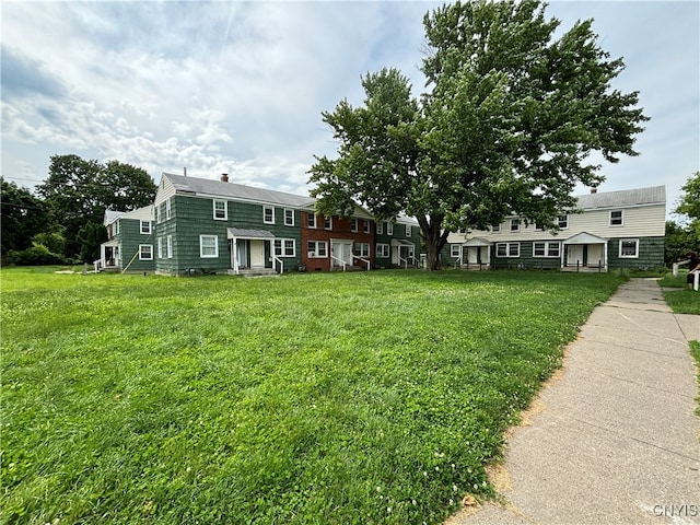 exterior space featuring a front lawn