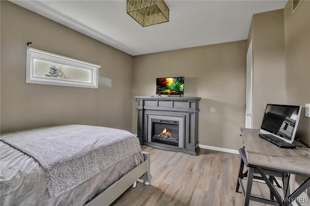 bedroom featuring light hardwood / wood-style floors