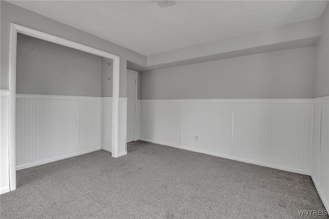 empty room featuring carpet flooring