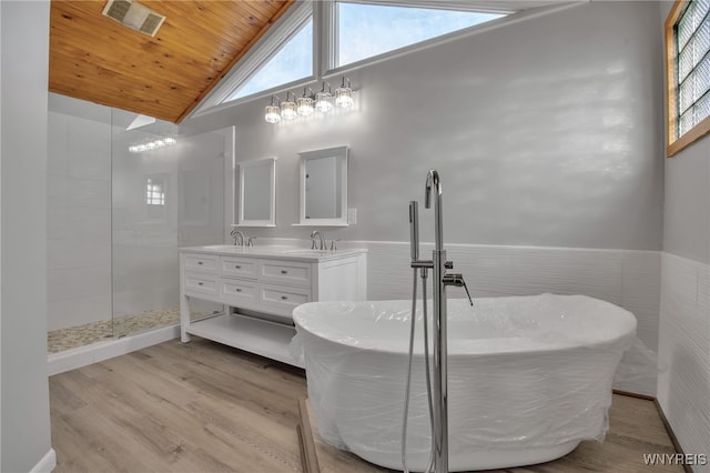 bathroom featuring separate shower and tub, wooden ceiling, hardwood / wood-style floors, vaulted ceiling, and vanity