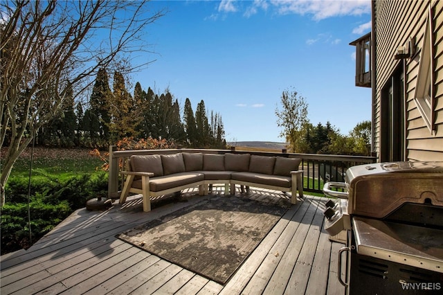 wooden terrace featuring an outdoor living space