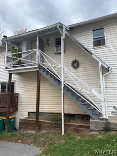 view of side of home with a balcony