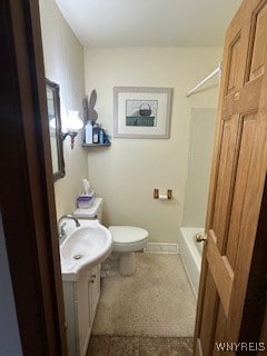 full bathroom featuring vanity, bathing tub / shower combination, and toilet