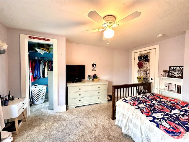 bedroom featuring light carpet, a closet, and ceiling fan