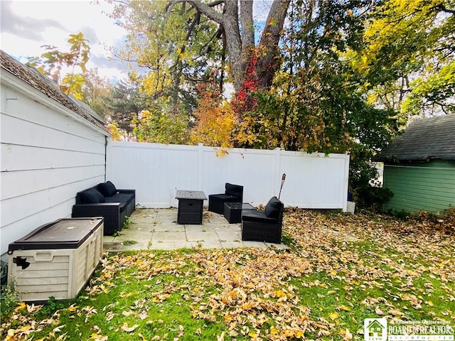 view of yard with outdoor lounge area and a patio area