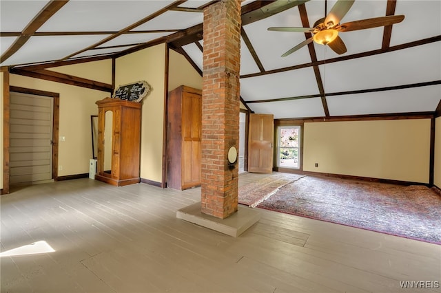 unfurnished living room featuring ornate columns, light hardwood / wood-style floors, and ceiling fan