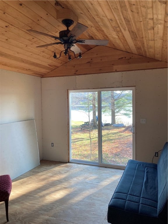 sitting room with vaulted ceiling, ceiling fan, and wood ceiling