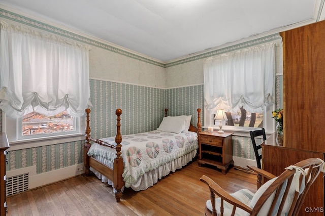 bedroom featuring wood-type flooring