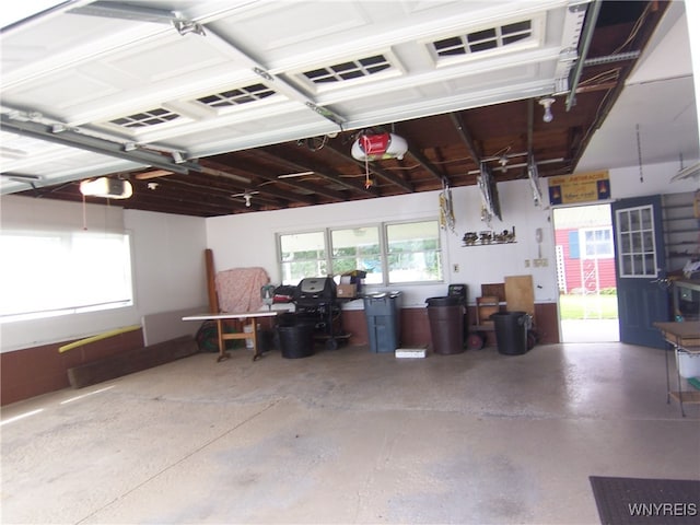 garage featuring a garage door opener