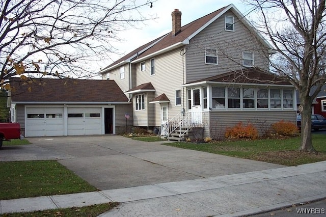 front of property featuring a garage