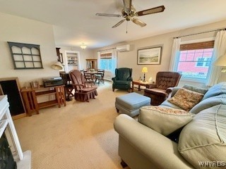 living room featuring carpet floors, a wall mounted AC, and ceiling fan