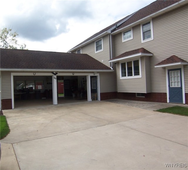 exterior space with a garage