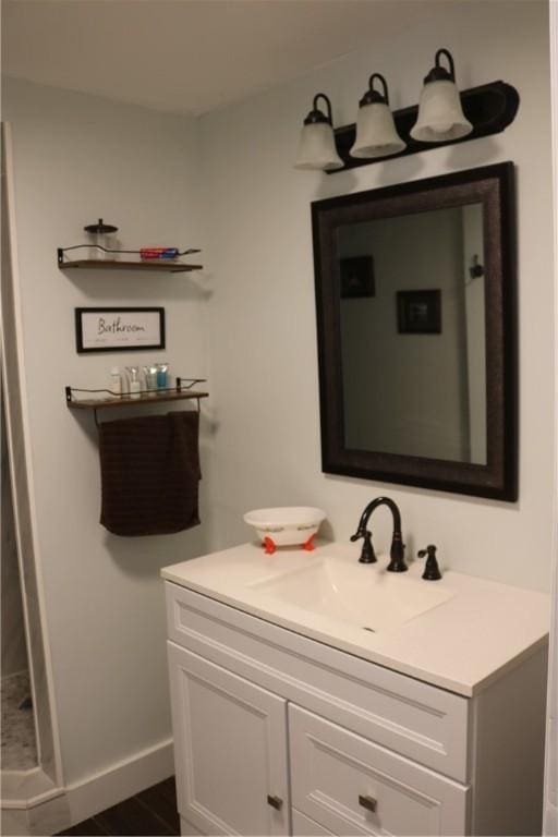 1323 Crystal Lake Rd, Deposit, NY 13783 - bathroom featuring vanity, a shower stall, and wood finished floors