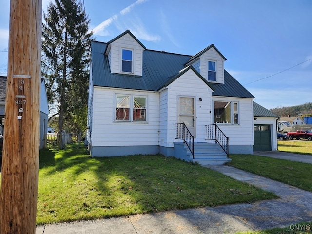 view of front of property with a front lawn and a garage