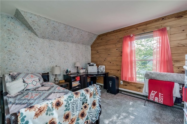 carpeted bedroom featuring multiple windows, vaulted ceiling, and wood walls