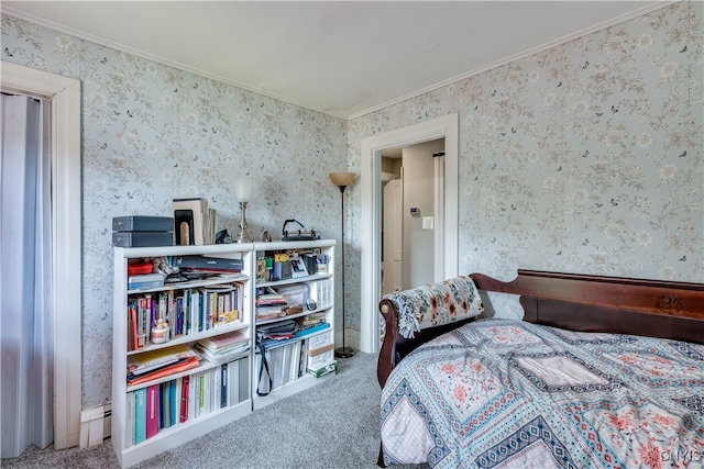 bedroom featuring a baseboard radiator, crown molding, and carpet flooring