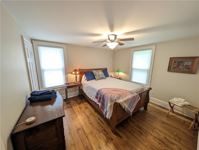 bedroom featuring wood-type flooring and ceiling fan